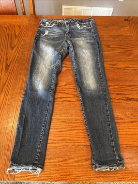 Women’s KanCan Distressed Skinny Jeans size 28 inseam measures about 30”